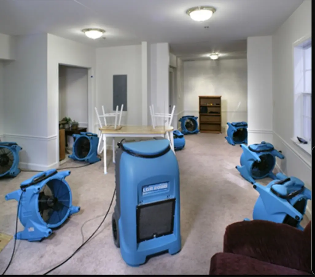 Air movers and dehumidifier setup for Water Extraction & Removal in Fraser